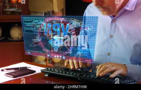 VPN on computer screen. VPN, virtual private network and encrypted link tunnel abstract concept 3d with glitch effect. Man typing keyboard. Stock Photo