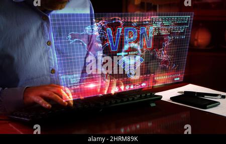 VPN on computer screen. VPN, virtual private network and encrypted link tunnel abstract concept 3d with glitch effect. Man typing keyboard. Stock Photo