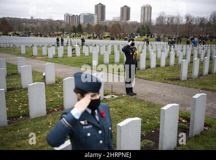 Canadian Forces members salute during the Last Post during a Remembrance Day ceremony at the National Military Cemetery in Ottawa, on Wednesday, Nov. 11, 2020. Members of the public were encouraged to follow the ceremony from home via livestream, while a fenced off area limited attendance to comply with COVID-19 restrictions for gatherings. THE CANADIAN PRESS/Justin Tang