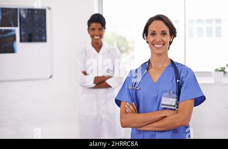Confident in their care. Cropped shot of two attractive young female doctors. Stock Photo