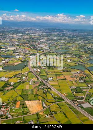 Sunny aerial view of the Guanyin District, Taoyuan City at Taiwan Stock Photo