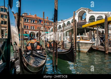 Gondolas on Grand Canal near Rialto bridge in Venice Stock Photo
