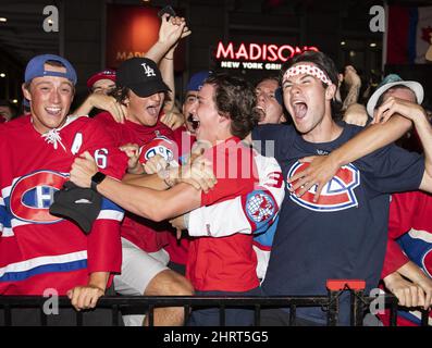 Montreal Canadiens fans react to a goal 