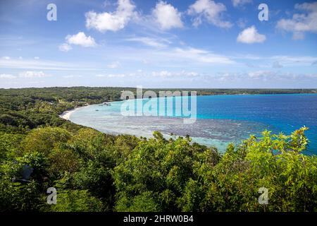 View over the clear blue waters of Easo Bay on Lifou Island in New Caledonia. Stock Photo
