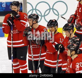 Canadian hockey team members Sidney Crosby, left, and Dany Heatley joke  around during a team practice at the 2010 Winter Olympic Games in  Vancouver, Saturday, Feb. 27, 2010. Team Canada will play