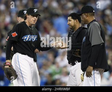 New York Yankees pitcher Scott Proctor adjusts his cap after giving up a  three-run home run to the Boston Red Sox' Jacoby Ellsbury in the 14th  inning. The Red Sox defeated the