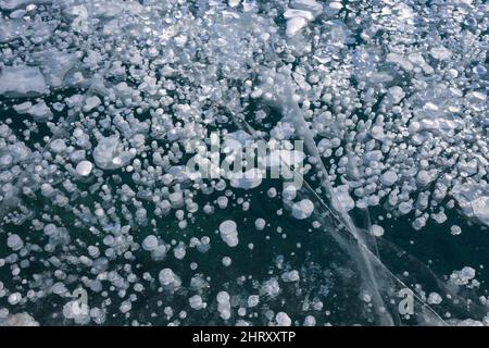 methane gas bubbles Abraham Lake Alberta Canada Stock Photo