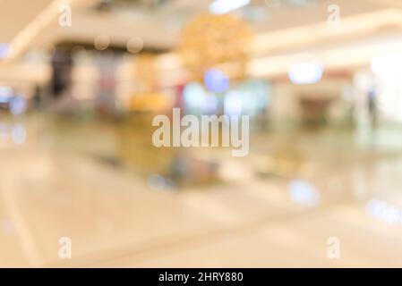 defocus internal view of large shopping mall show a beautiful light bokeh Stock Photo