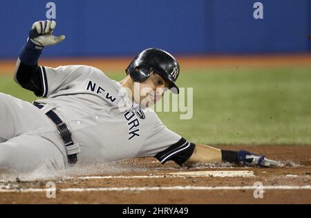 New York Yankees Nick Swisher hits a solo homer in the ninth inning against  the Toronto Blue Jays at Yankee Stadium in New York City on August 2, 2010.  The Toronto Blue