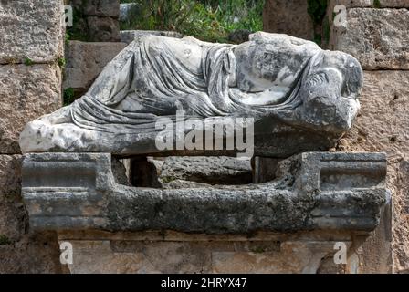 The statue of Kestros the river god at the Perge Nymphaeum in Turkey. This fountain is where spring water first entered the ancient city. Stock Photo