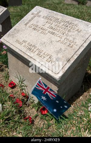 The headstone of Australian World War One soldier John Simpson Kirkpatrick located in the Beach Cemetery at Gallipoli in Turkey. Stock Photo