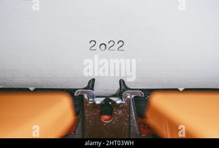 Old Typewriter with following text on paper - 2022 Chapter one. Stock Photo