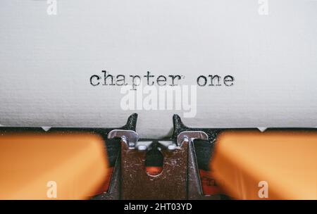 Old Typewriter with following text on paper - 2022 Chapter one. Stock Photo