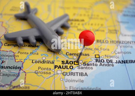 Pin marked São Paulo on map with red pin nad plane in Brazil Stock Photo