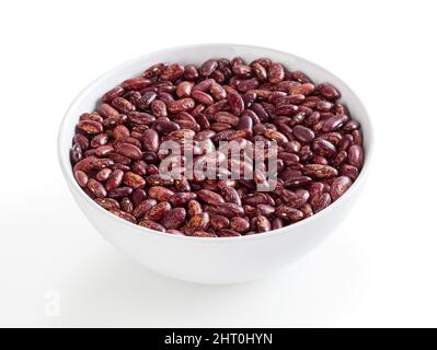 Red pinto beans in white bowl isolated on white background with clipping path Stock Photo