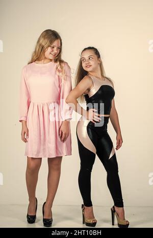 two fashionable teen girls isolated on white, fashion Stock Photo - Alamy