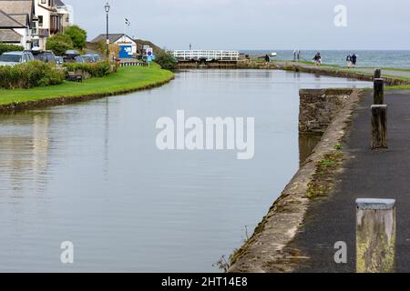 BUDE, CORNWALL, UK - AUGUST 15 : The canal at Bude in Cornwall on August 15, 2013. Unidentified people. Stock Photo