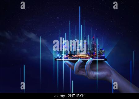 Modern cityscape and communication network concept. (Internet of Things). ICT (Information communication Technology). 5G. Smart city. Digital transfor Stock Photo