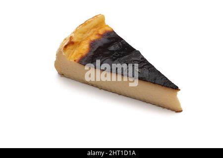 A delicious piece of baked flan. Isolated on white background. Stock Photo