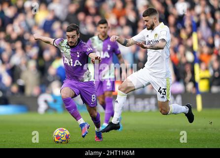 Tottenham Hotspur's Harry Winks (left) and Leeds United's Mateusz Klich battle for the ball during the Premier League match at Elland Road, Leeds. Picture date: Saturday February 26, 2022. Stock Photo