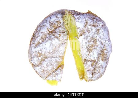 Paczki are filled donuts made before Mardi Gras. They have a sweeter and richer dough,  fried in the same way as yeasted doughnuts. Stock Photo