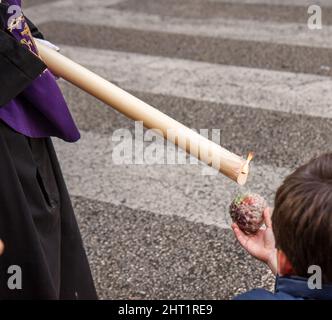 Holy week, procession of the Brotherhood of Crucifixion in Calle Carretera on holy Monday Stock Photo