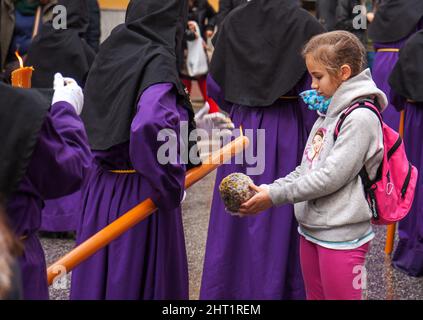 Holy week, procession of the Brotherhood of Crucifixion in Calle Carretera on holy Monday Stock Photo