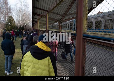 Przemysl, Warsaw, Poland. 26th Feb, 2022. People wait for their relatives as they arrive at Przemysl main train station on February 26, 2022 in Przemysl, Poland. Poland set up reception centers as Ukrainian citizens flee their country from war. (Credit Image: © Aleksander Kalka/ZUMA Press Wire) Stock Photo