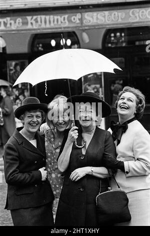 The stars of 'The Killing of Sister George' posing outside the St Martin's Theatre on St Martin's Lane, they are Lally Bowers, Eileen Atkins, Beryl Reid and an unnamed actress. 16th June 1965. Stock Photo