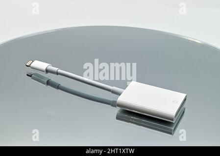 Sd card reader to lightning connector for Apple devices Stock Photo