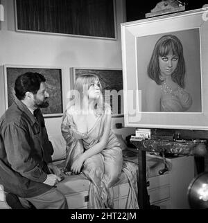 20-year-old Helen Mirren, star of Cleopatra at the Old Vic, has had many film an delay offers but turned them all down to continue her studies at drama school for another year. When she was in a restaurant the Hampstead artist Nicholas Egon spotted her and wanted to paint her. Helen and Nicholas are pictured in his Hampstead studio with the painting. 5th October 1965. Stock Photo