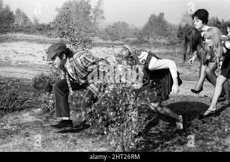 The filming of 'The Great St Trinian's Train Robbery' starring Portland Mason (James Mason's daughter) and George Cole as 'Flash' Harry. On location at Longmoor Army Camp, near Liss, Hampshire. 17th October 1965.The filming of 'The Great St Trinian's Train Robbery' starring Portland Mason (James Mason's daughter) and George Cole as 'Flash' Harry. On location at Longmoor Army Camp, near Liss, Hampshire. 17th October 1965. Stock Photo