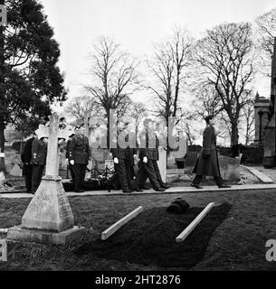 A full scale rehearsal of Sir Winston Churchill's funeral is carried out in Oxfordshire. Pallbearers from the Irish Guards march slowly away from the grave having placed the coffin in it at St Martin's Church, Bladon. 28th January 1965. Stock Photo