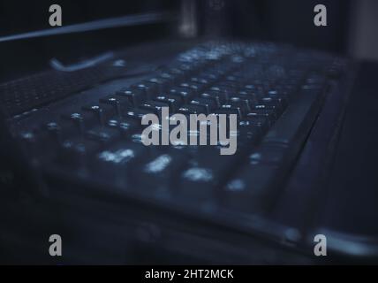 Typo for your thoughts. Closeup shot of a keyboard in a server room. Stock Photo