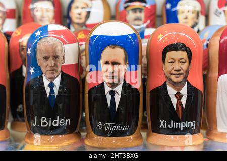 Moscow , Russia - February 26, 2022: Putin, Biden and Xi Jinping in the form of Russian nesting dolls in a gift shop in Moscow. Relations between Russia, USA and China. High quality photo Stock Photo