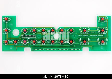 Printed circuit board showing the miniature push buttons on keyboard assembly of a small dedicated computer unit used on industrial weighing equipment Stock Photo