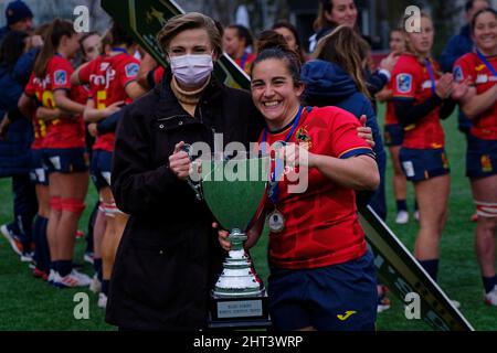 Alcobendas, Spain. 26th Feb, 2022.  Rugby Europe Women´s Championship 2022 - Spain VS Russia. The Rugby Europe Championship is the top level Rugby Europe Women senior competition. L to R: Coral Bistuer, Taekwondo athlete and General Director of Sports of the Community of Madrid, and Patricia Garcia who is retiring after 12 years in the Spanish Rugby team. They hold the trophy of the European Women's Rugby Championship. Las Terrazas Stadium, Alcobendas, Spain. Credit: EnriquePSans / Alamy Live News Stock Photo