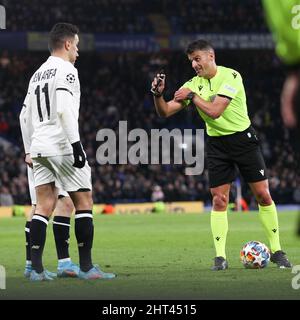 London, UK. 26th Feb, 2022. Hatem Ben Arfa of Lille is spoken to by Referee Jesus Gil Manzano (Esp) during the UEFA Champions League match between Chelsea and Lille at Stamford Bridge, London, England on 22 February 2022. Photo by Ken Sparks. Editorial use only, license required for commercial use. No use in betting, games or a single club/league/player publications. Credit: UK Sports Pics Ltd/Alamy Live News Stock Photo