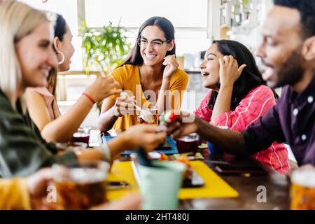 International group of young student friends having breakfast at coffee shop Stock Photo