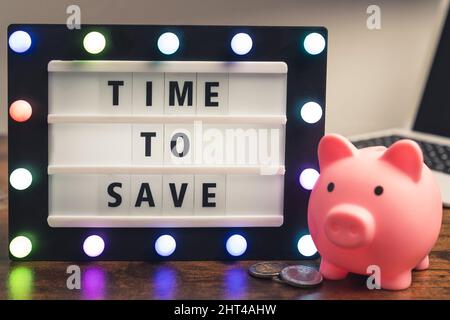Time to save phrase written on marquee lightbox - savings concept. High quality photo Stock Photo