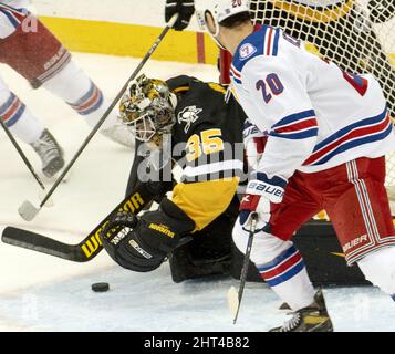 Pittsburgh Penguins goaltender Tristan Jarry (35) covers the puck during the second period of the 1-0 Penguins win against the New York Rangers at PPG Paints Arena in Pittsburgh on Saturday, February 26, 2022.    Photo by Archie Carpenter/UPI Stock Photo