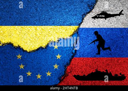Russia ,Ukraine and europe Nato painted flags on a wall with a crack , war background concept Stock Photo