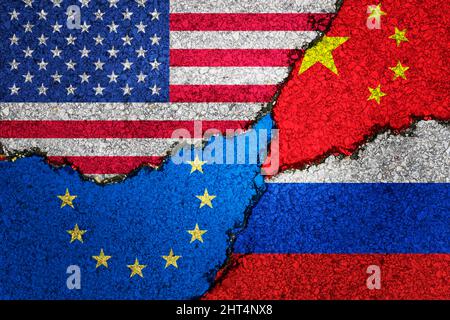 Russia ,Ukraine,usa, and europe Nato painted flags on a wall with a crack , war background concept Stock Photo