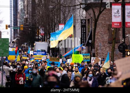 DOWNTOWN VANCOUVER, BC, CANADA - FEB 26, 2022: Protest rally against Vladimir Putin and the Russian invasion of Ukraine that was attended by thousands Stock Photo