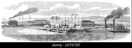 Floating Railway across the Forth, between Granton and Burntisland, [near Edinburgh, Scotland], 1850. View of the '...Leviathan, as the vessel is called...lying alongside the east side of Granton Pier, with the landing slip and apparatus for drawing off a train...upwards of twenty loaded waggons, and a passenger carriage [of the Edinburgh, Perth and Dundee Railway]...were ferried across the Forth...this mode of crossing...without changing carriages...is expected to render this the most agreeable route to and from the north of Scotland. Goods, minerals [passengers], and livestock will new be co Stock Photo
