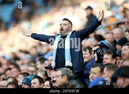 A Coventry City fan shows support in the stands during the Sky Bet Championship match at the Coventry Building Society Arena, Coventry. Picture date: Saturday February 26, 2022. Stock Photo