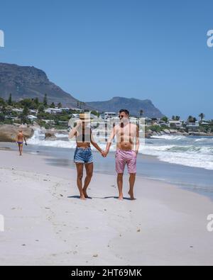 Clifton beach Cape Town South Africa, white sandy beach in Cape Town Clifton. Couple man and woman on the beach Stock Photo