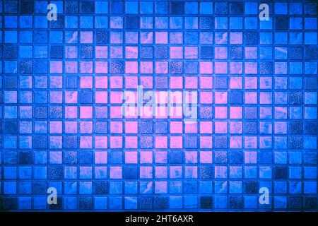 Cellular background with pale blue, pink and dark tiles Stock Photo