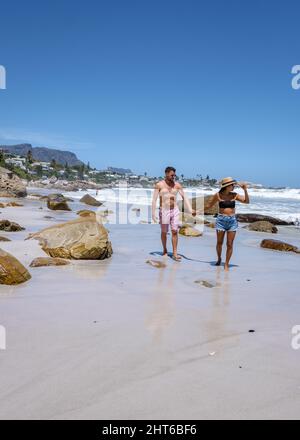 Clifton beach Cape Town South Africa, white sandy beach in Cape Town Clifton. Couple man and woman on the beach Stock Photo