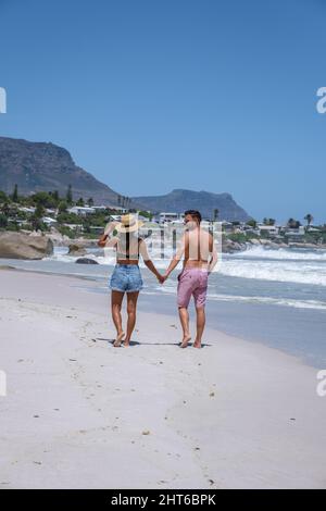 Clifton beach Cape Town South Africa, white sandy beach in Cape Town Clifton. Couple man and woman on the beach Stock Photo